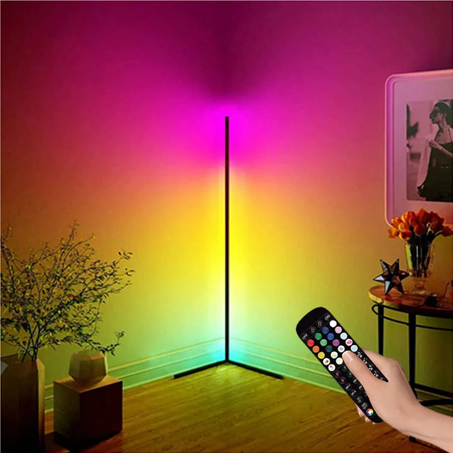 Black smart floor lamp with aluminium body and silicone shade, showing remote control