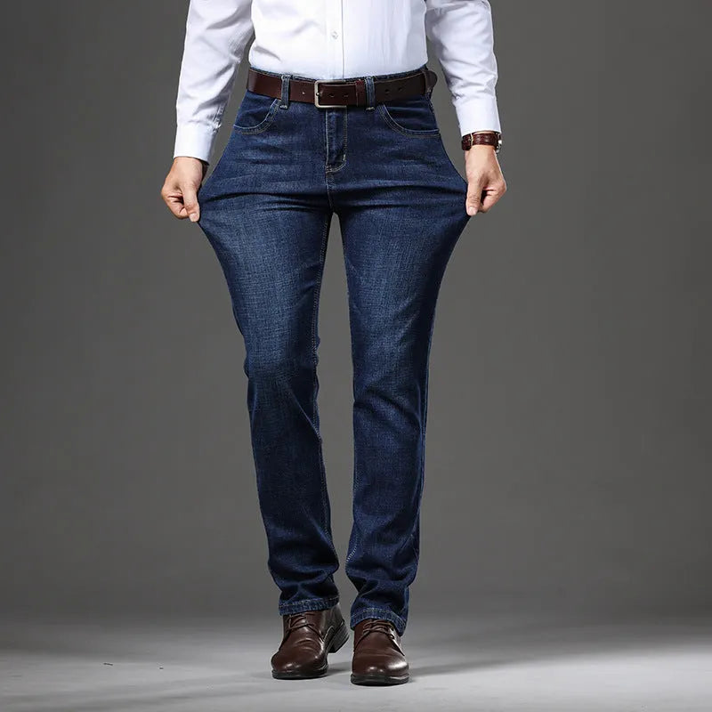 Women's black stretch jeans with straight-leg business casual styling and mid-waist zip placket
