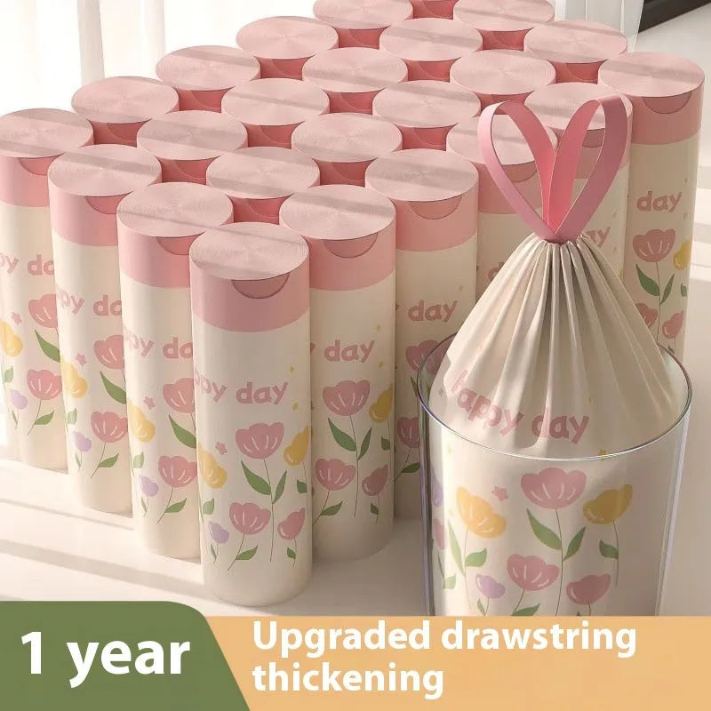 Pile of bold pink degradable drawstring garbage bags with argy wormwood for mosquito repellency.