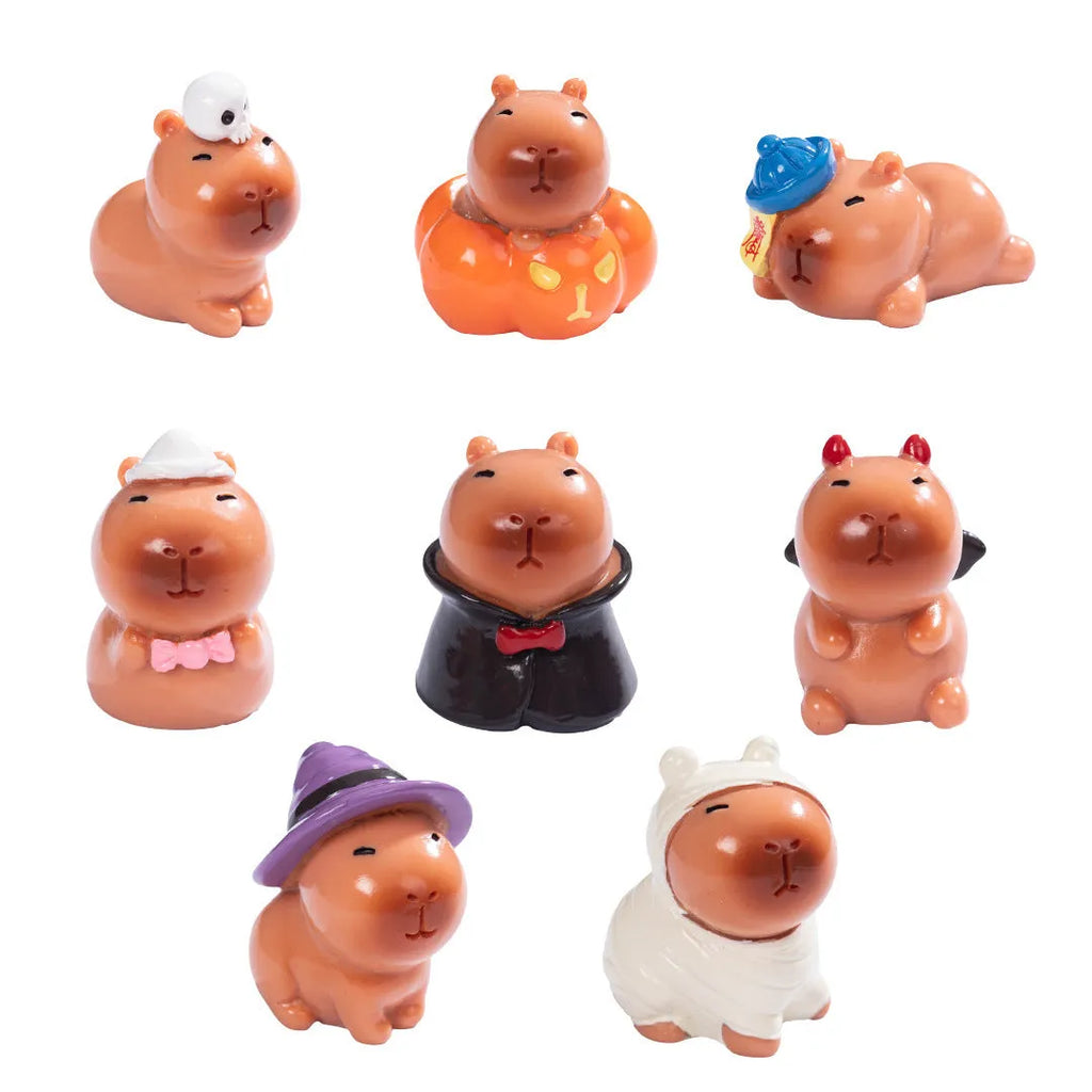 Micro landscape Halloween cute capybara resin decoration in pumpkin costume on a shelf