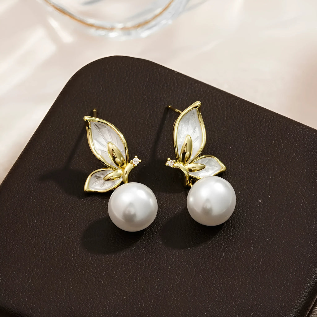 Gold-coloured butterfly earrings with zircon painting detail on copper metal for women