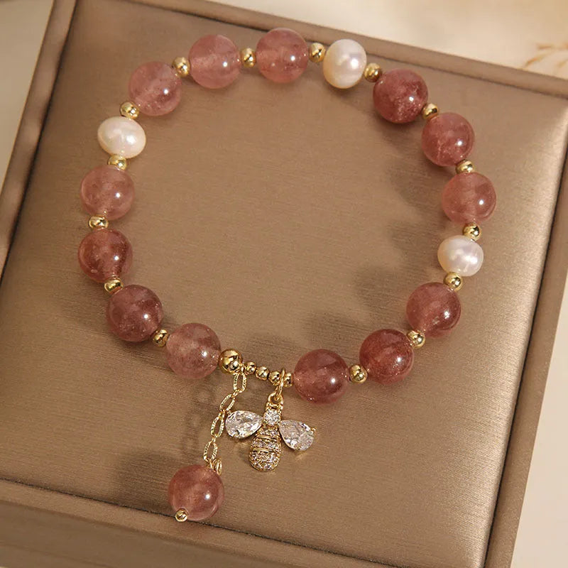 Women's strawberry quartz and freshwater pearl bracelet with bee charm and zircon accents
