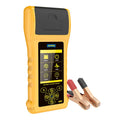 Autool BT760 car battery tester with colour screen and attached battery clips on a workbench