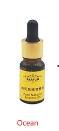 10ml bottle of Cologne Marine Humidifier Essential Oil with dropper, available in Cologne, Jasmine, and Ocean scents