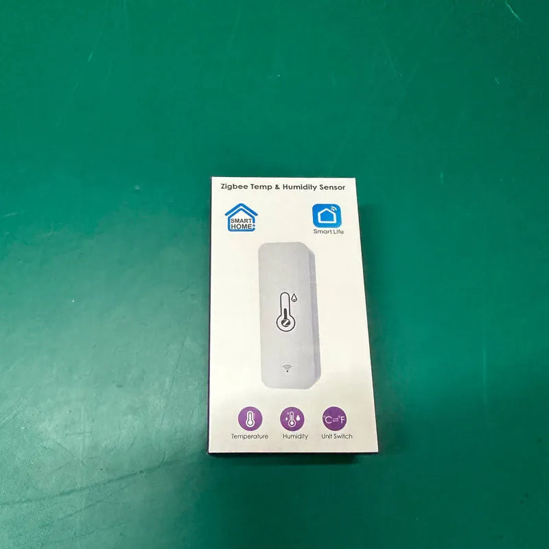 WiFi Zigbee temperature and humidity sensor in white ABS plastic casing showing digital display