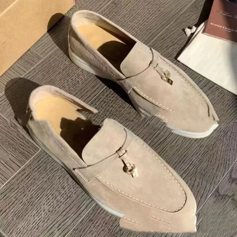 Pair of high-top gommino slip-on loafers in a choice of colours with round toe and rubber sole.