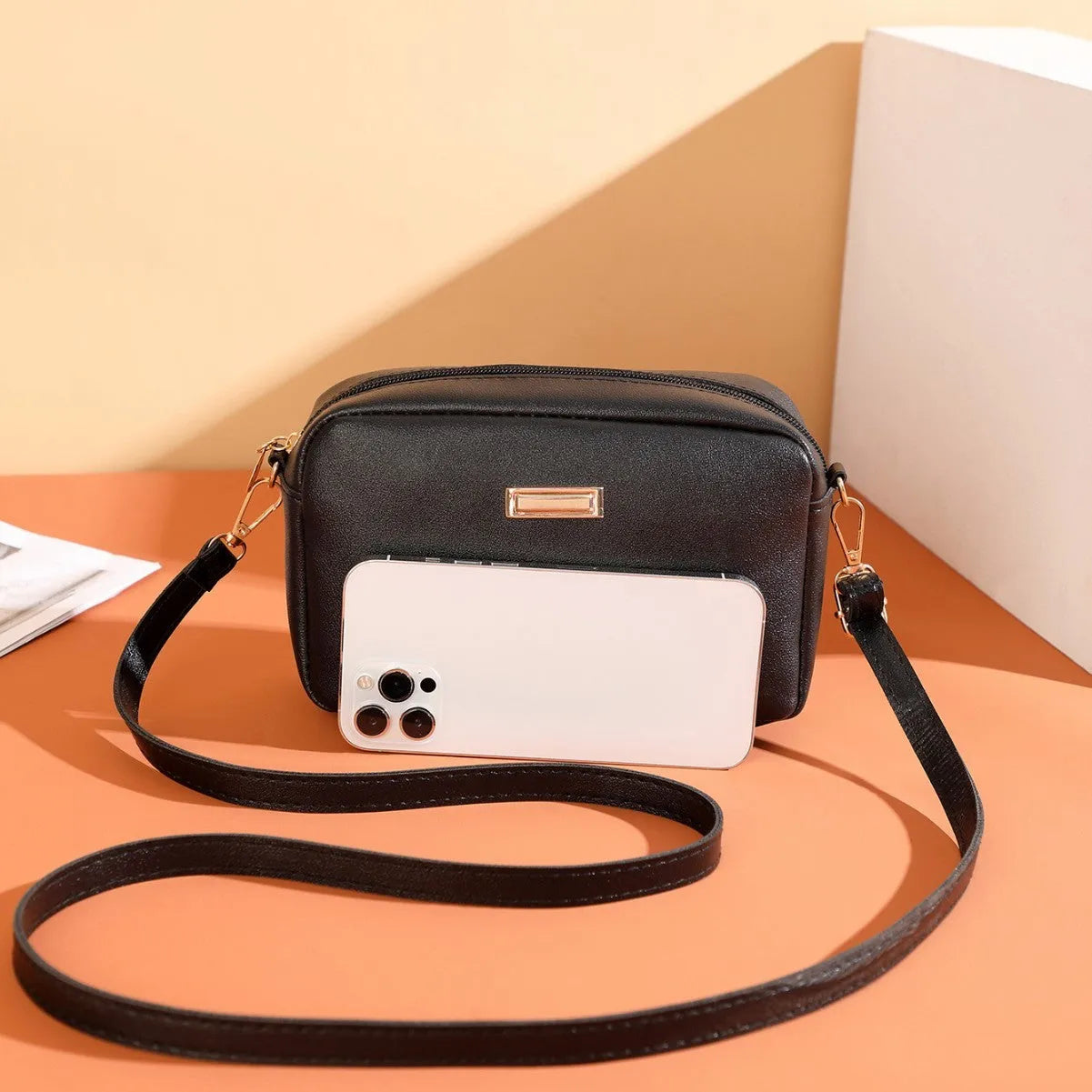 Women's solid colour PU shoulder bag with three-dimensional pockets and horizontal square shape