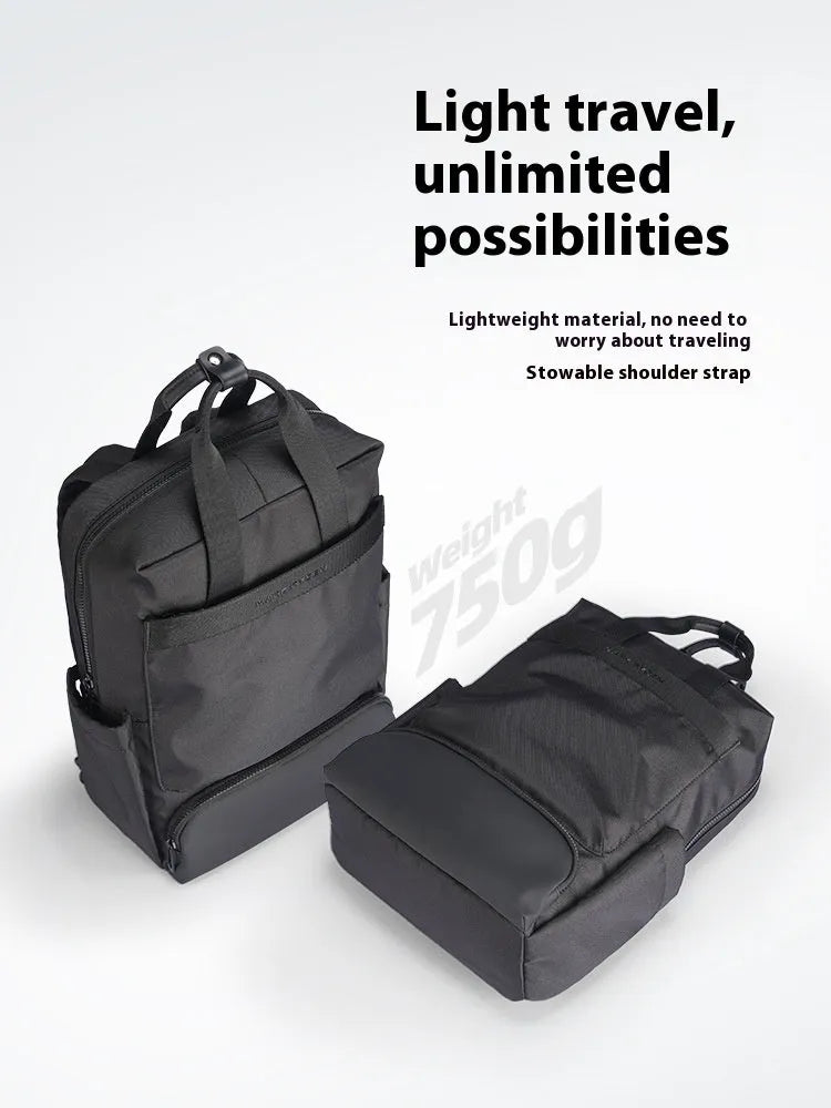 Lightweight black oxford cloth computer backpack with a 20-35 litre capacity.