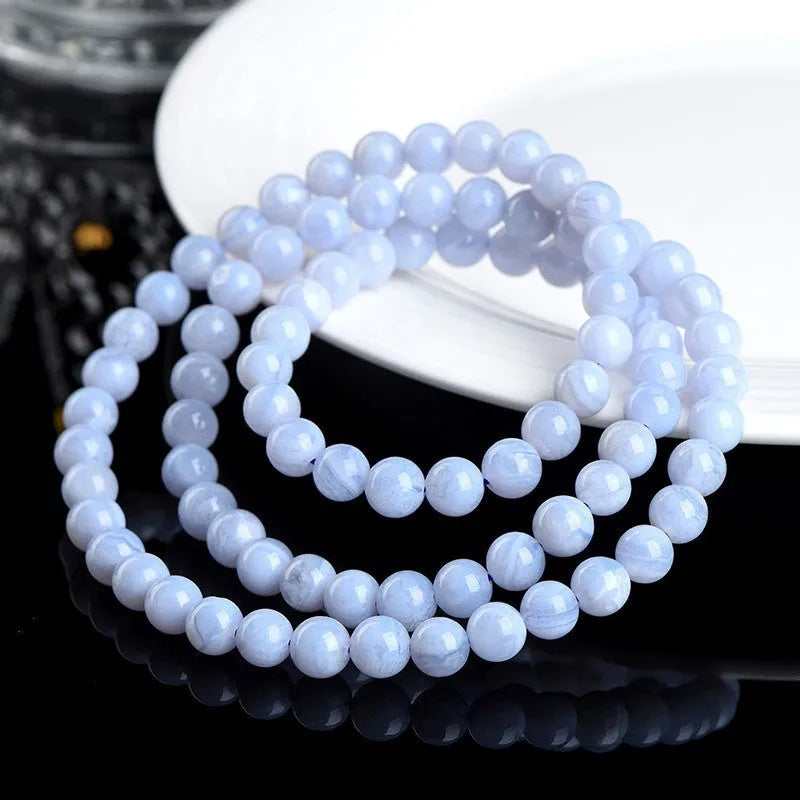 Blue agate bracelet with natural patterns, ruyi elements, and scattered bead arrangement