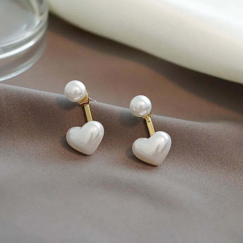 Heart-shaped pearl stud earrings with alloy setting and artificial gemstones in Korean style