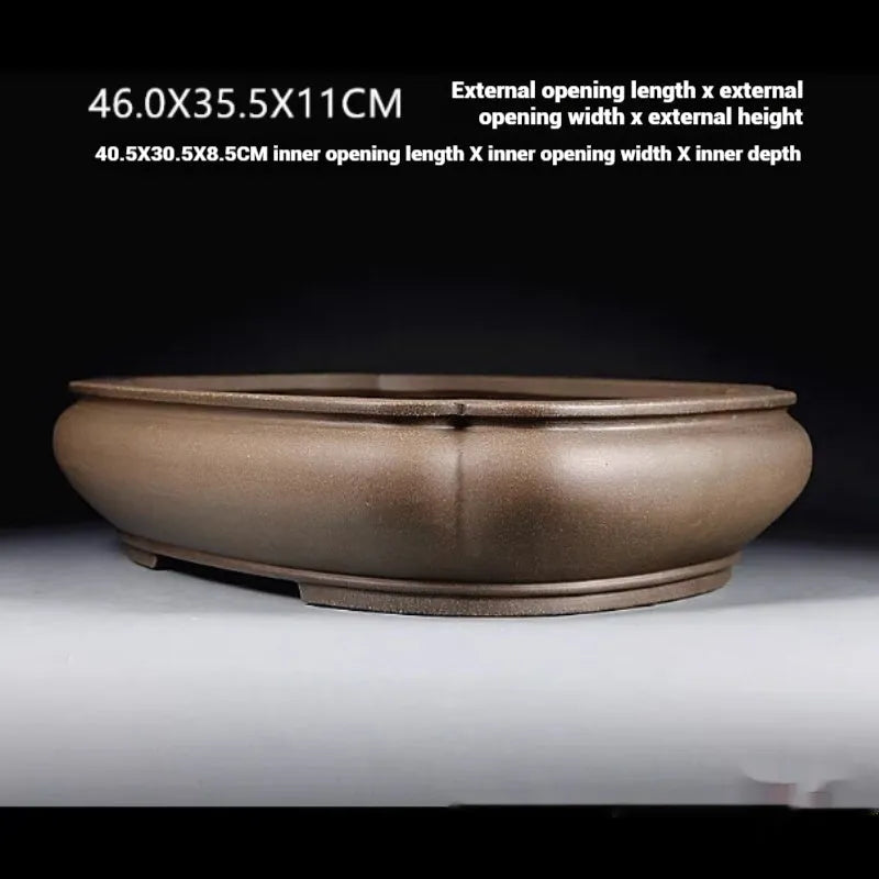 Handmade antique papaya-shaped purple clay flower pot with traditional Chinese design