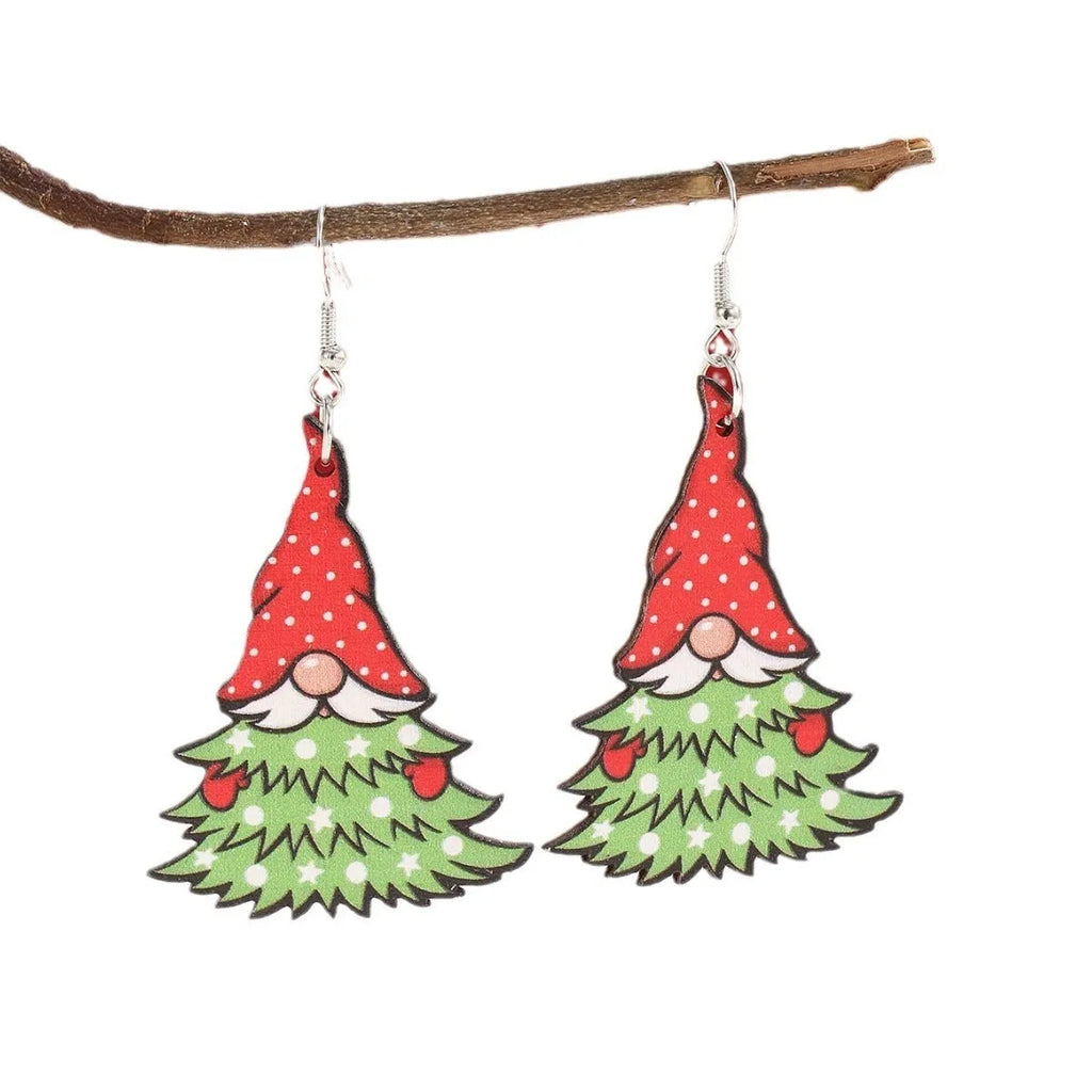 Women's wooden Christmas earrings with printed tree and snowman designs on geometric shapes.