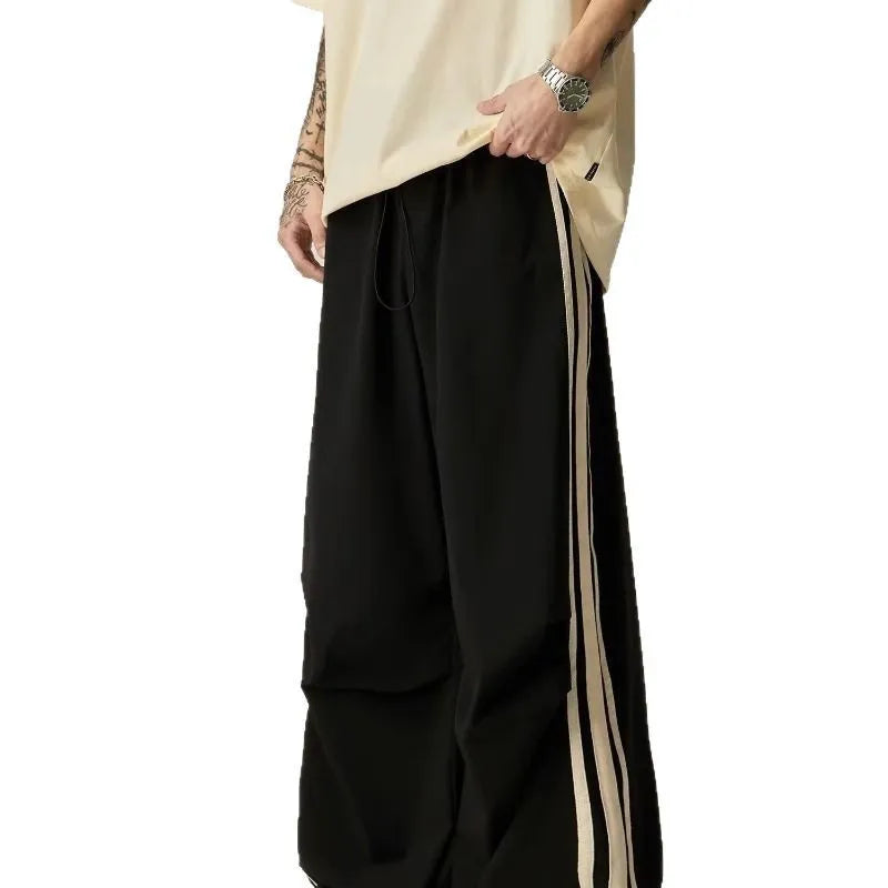 Men's black wide leg climbing pants with high waist and straight-leg design