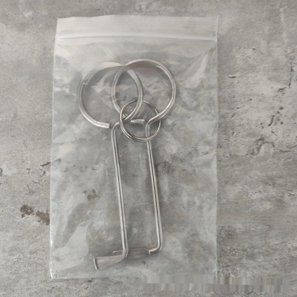 Two silver alloy wrench tools from a portable DIY and maintenance tool set.