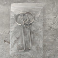 Two silver alloy wrench tools from a portable DIY and maintenance tool set.