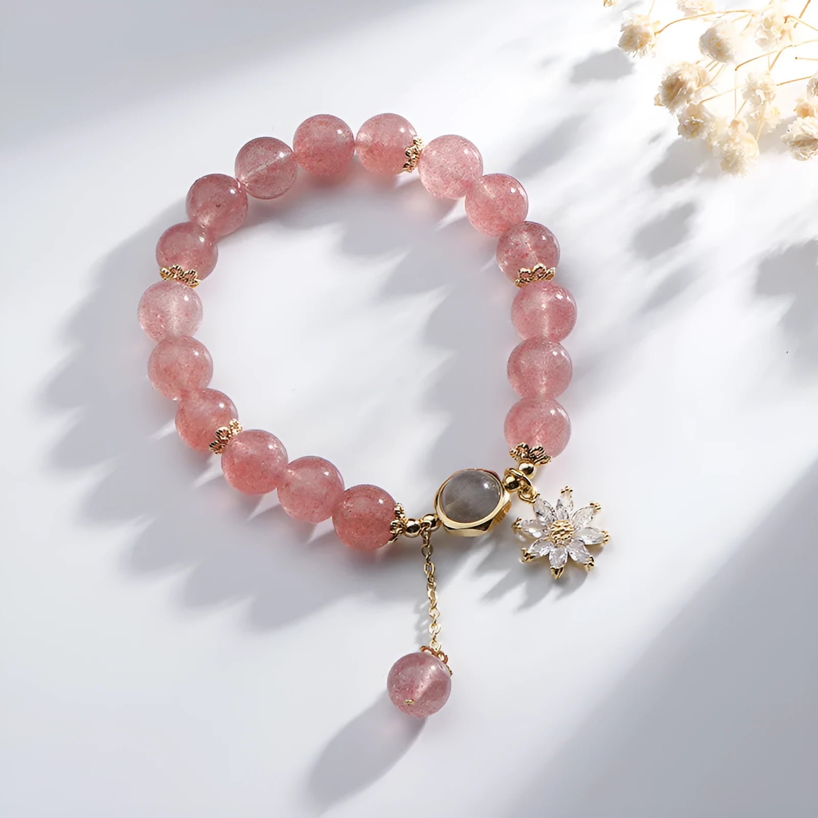 Natural strawberry quartz crystal bracelet with electroplated finish and flower design in mori style