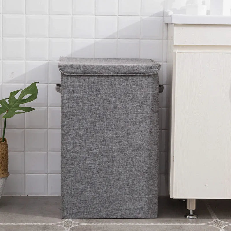 Foldable cotton linen storage basket in a neutral colour, shown in its three-dimensional form ready for use.