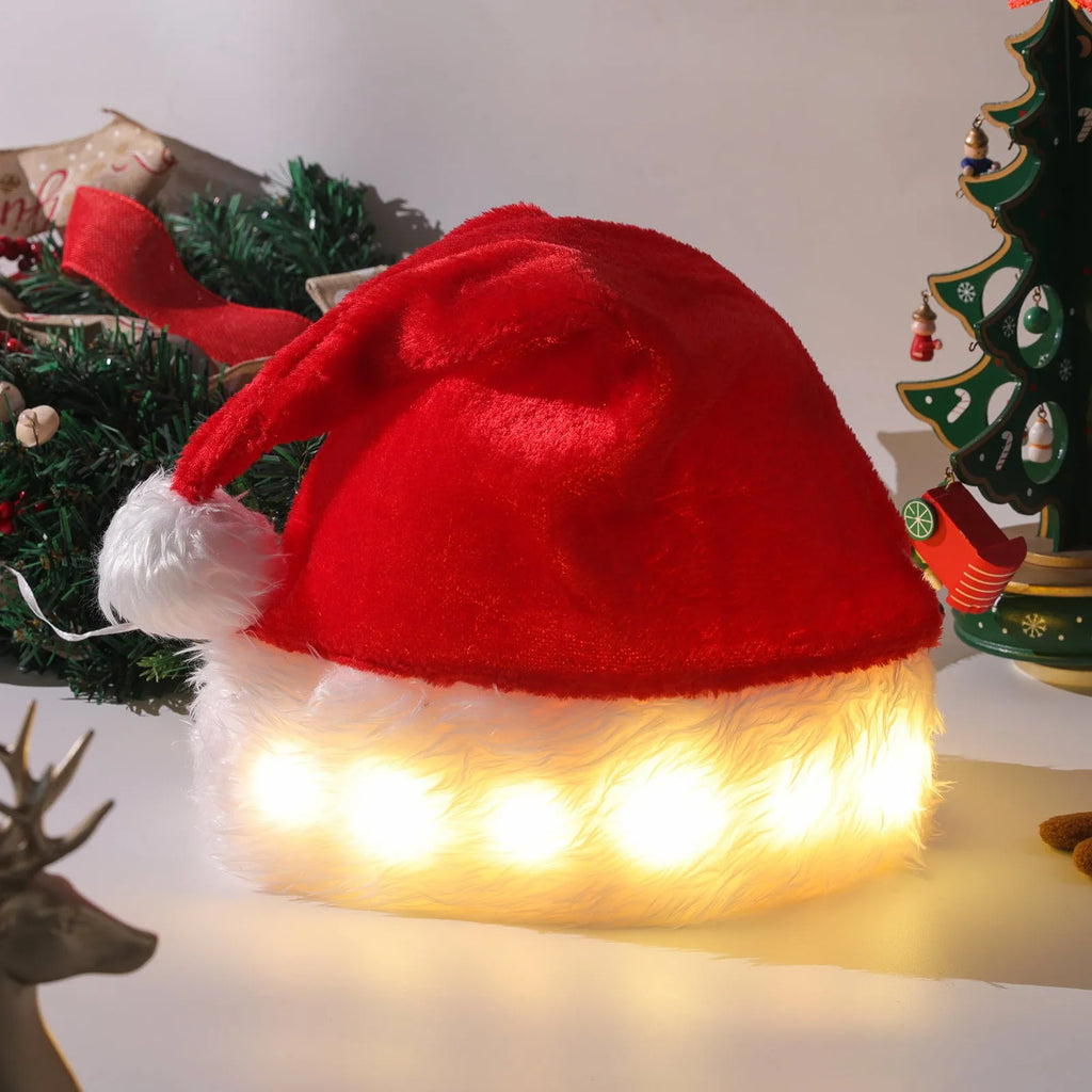 Red and white plush Santa hat with integrated twinkling LED lights and a white pom-pom.