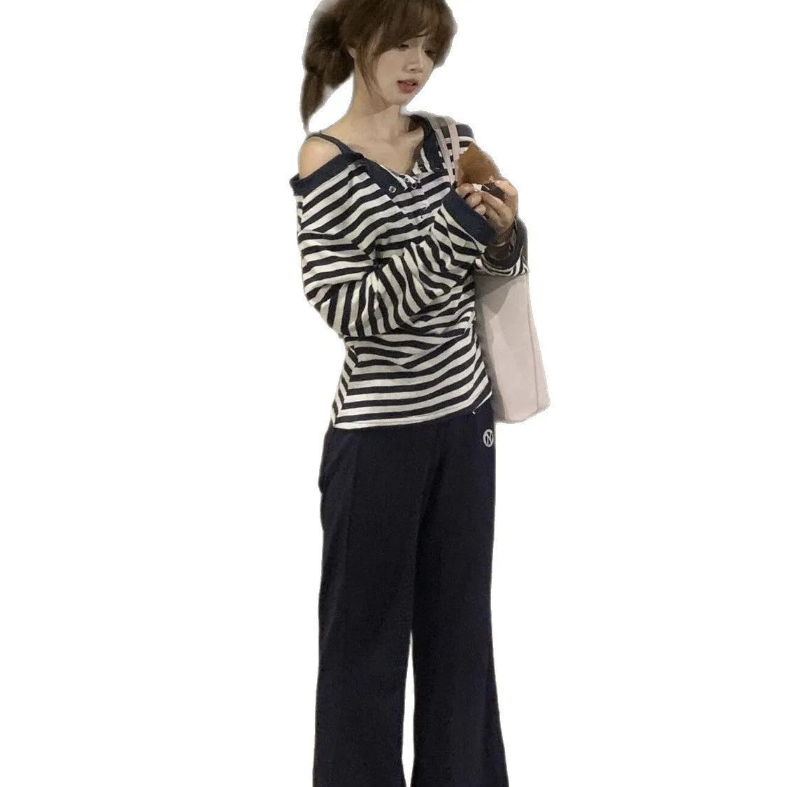 Dark blue Korean-style oversized women's T-shirt with embroidered stripes and button details on long sleeves