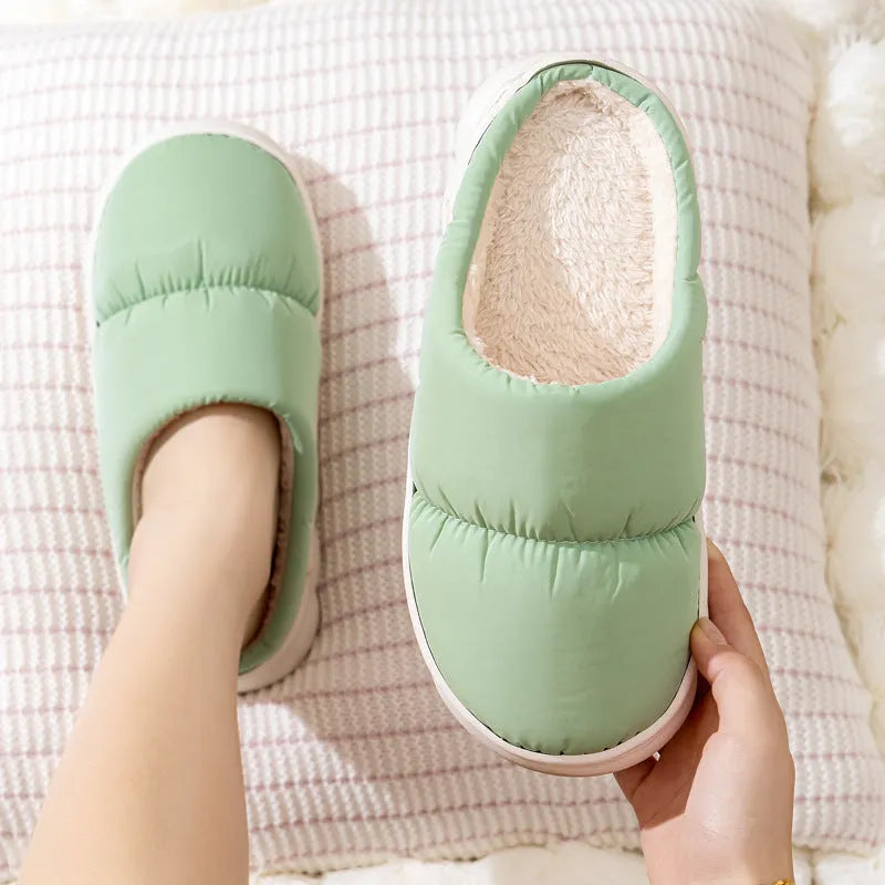 Pair of down cotton winter slippers with a thick rubber non-slip sole, shown in a choice of colours.