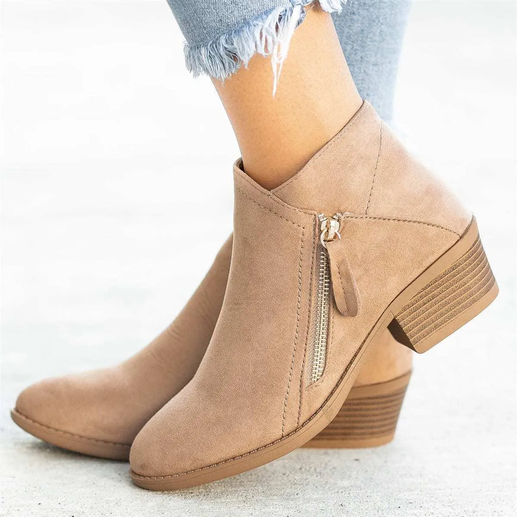 Women's suede ankle boots with chunky heel and side zip fastening in beige, black, blue, and orange colours