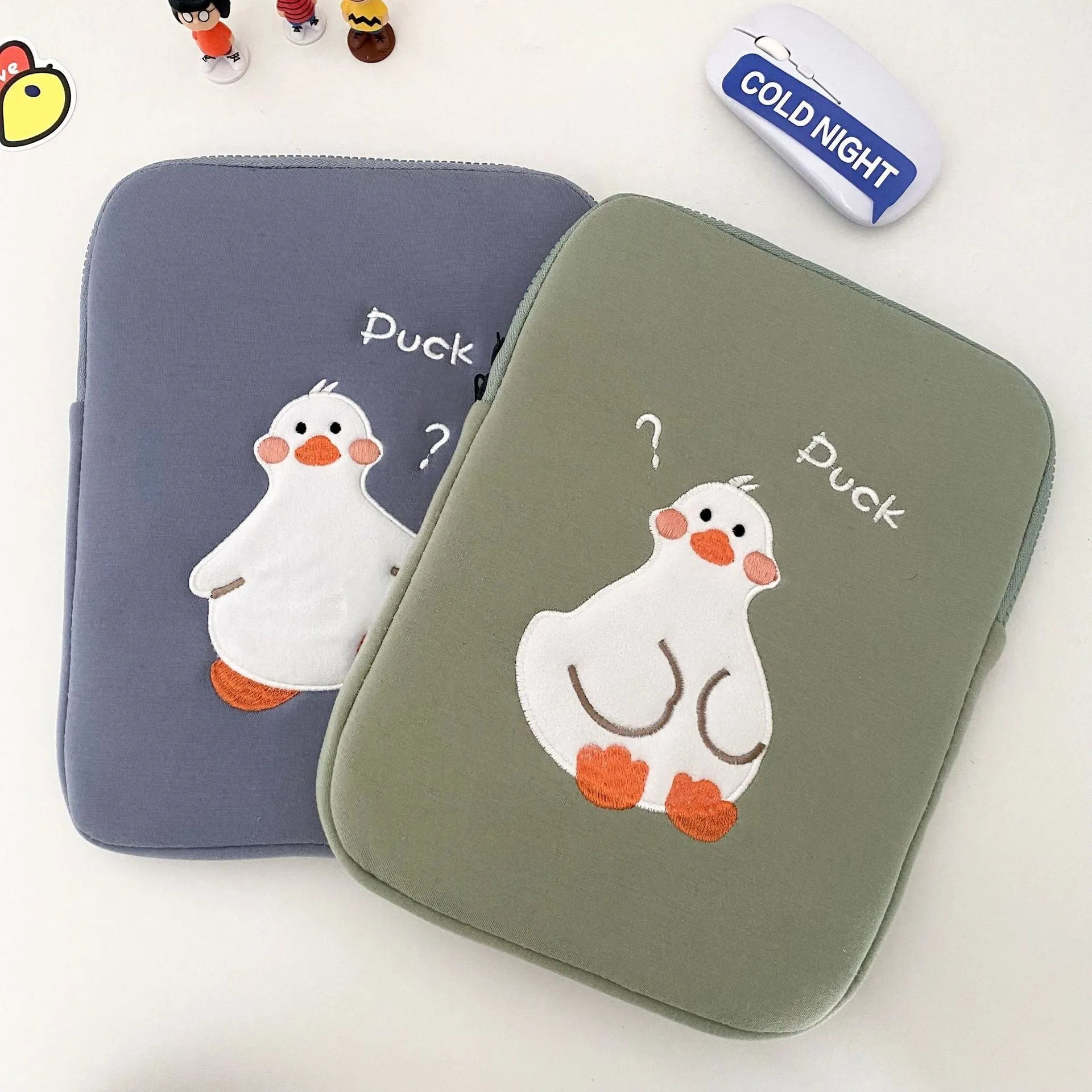 Blue cotton tablet case with duck embroidery design and zipper closure for iPad protection