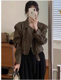 Women's brown retro imitation leather jacket with long sleeves and pocket details, slim fit.