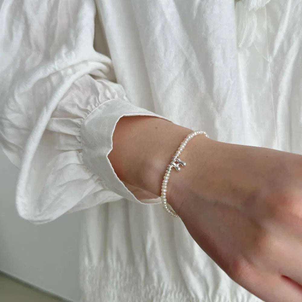Natural freshwater pearl bracelet with 925 silver chain and electroplated letter charm