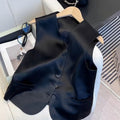 Black satin women's vest with loose fit and sleeveless design