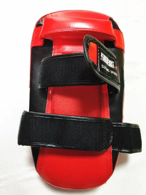 Black and red hand-held Sanda fighting foot target, 35cm long, with a double buckle strap on the back