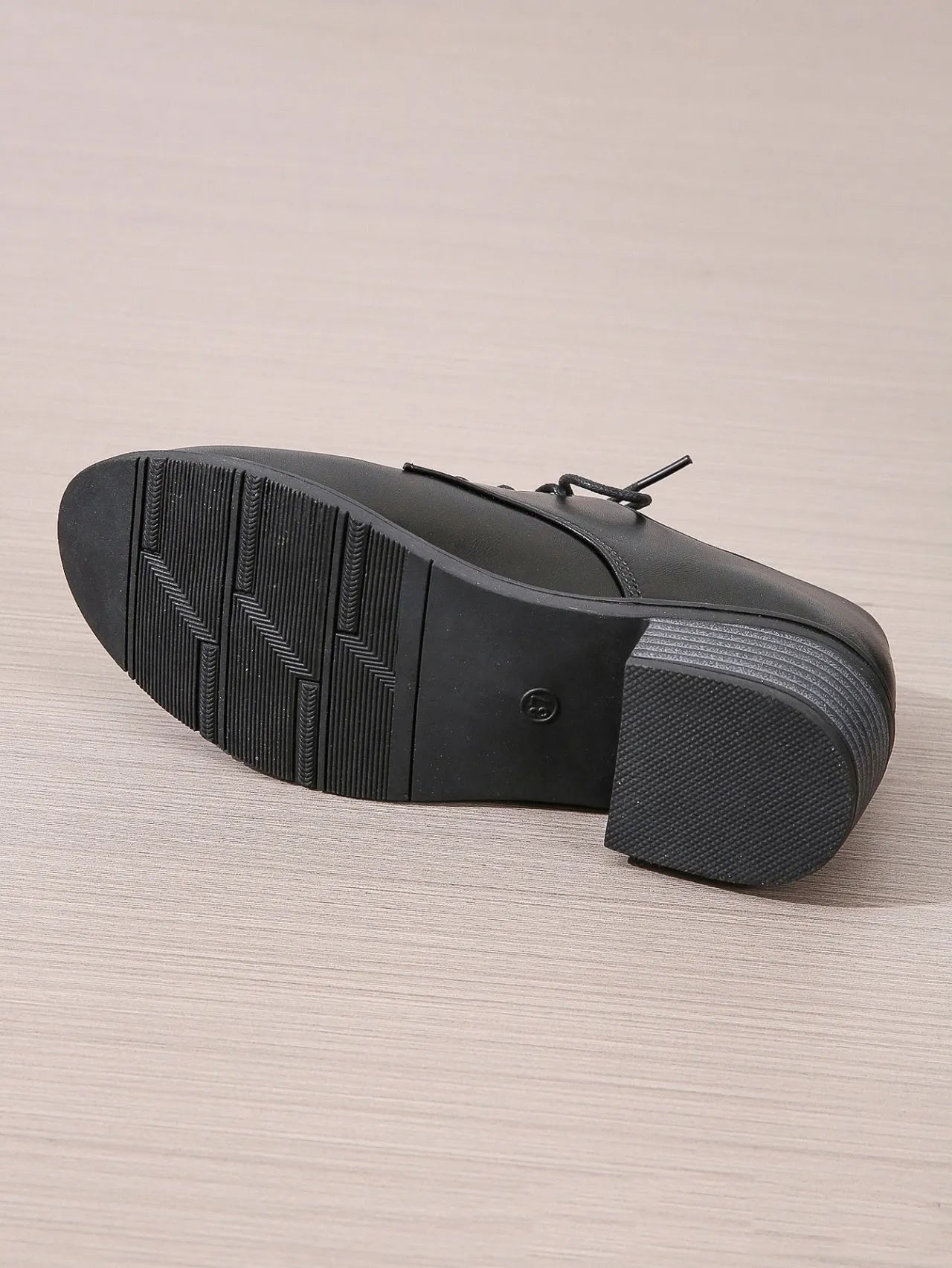 Black women's work shoes with chunky heel and soft sole for professional wear
