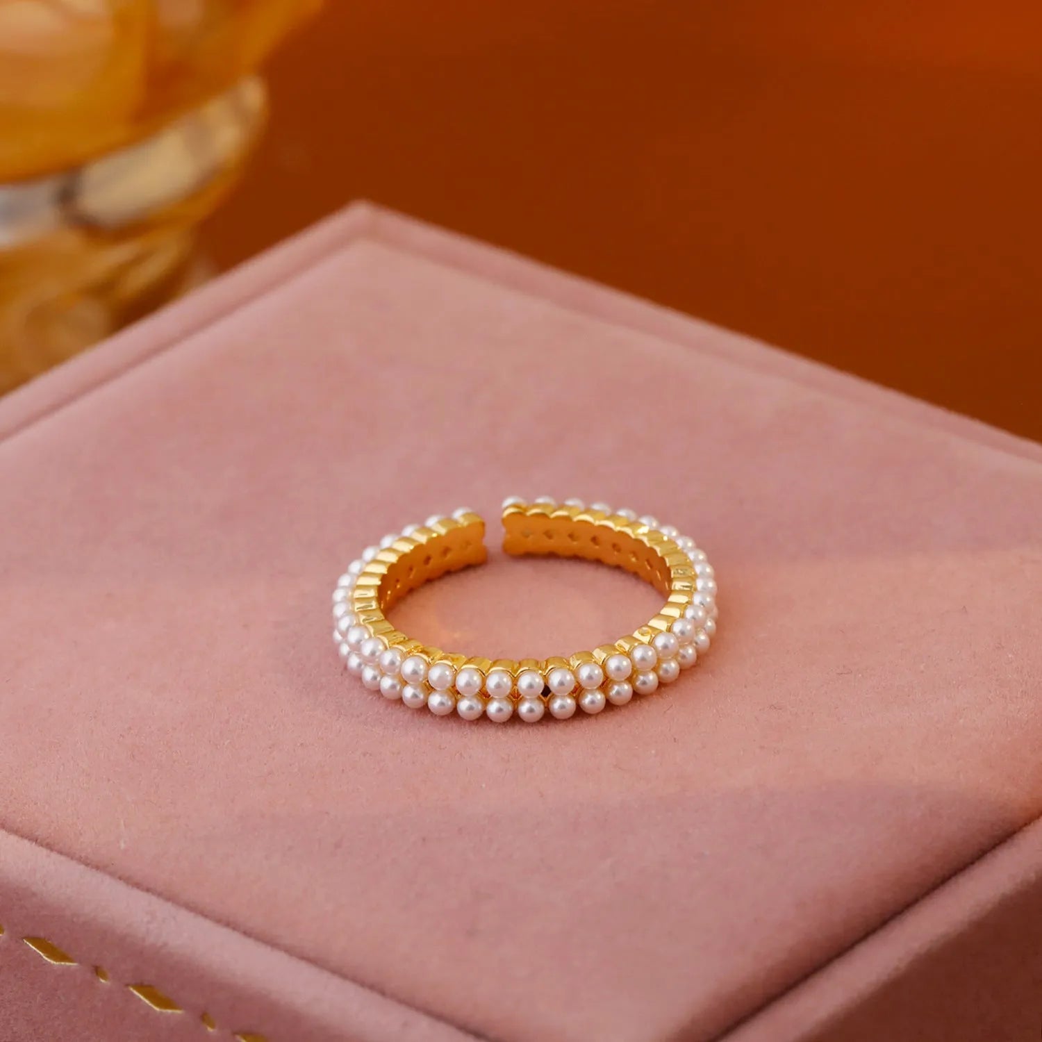 Gold electroplated geometric women's ring with adjustable open mouth design and round elements
