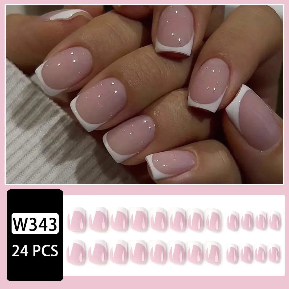 White plaid pattern artificial nail tips set with 24 pieces in an open box.