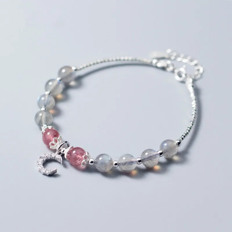 Handmade natural moonstone bracelet with crescent moon charm on adjustable chain