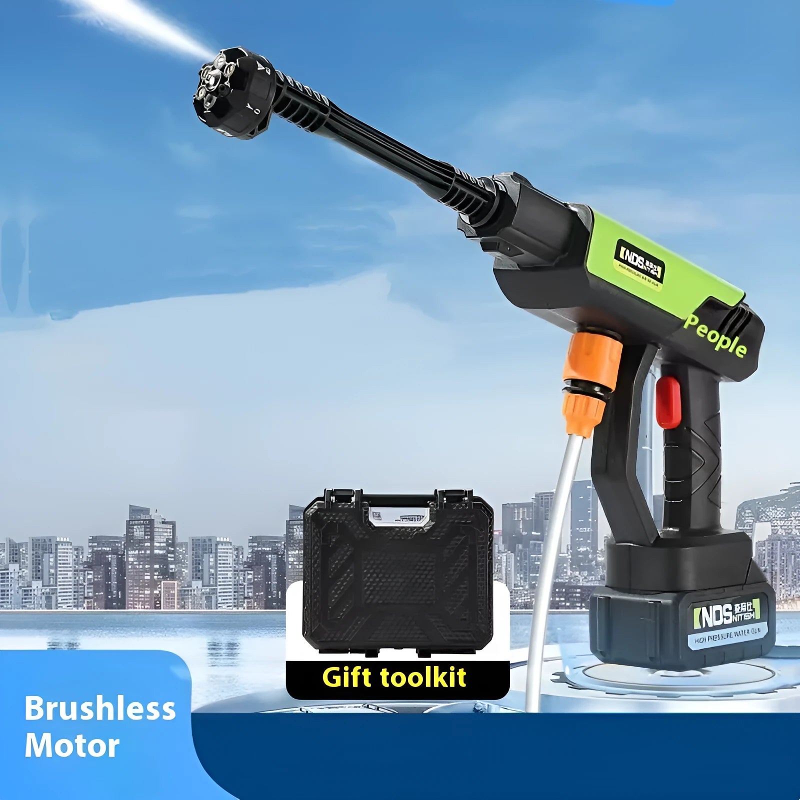 Green wireless high pressure water gun with multiple nozzle attachments on a table