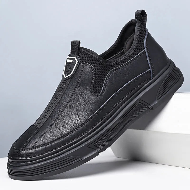 Men's casual leather shoes in solid black or brown with round toe design
