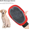 Red pet bathing glove with integrated brush for grooming and hair removal during pet baths.