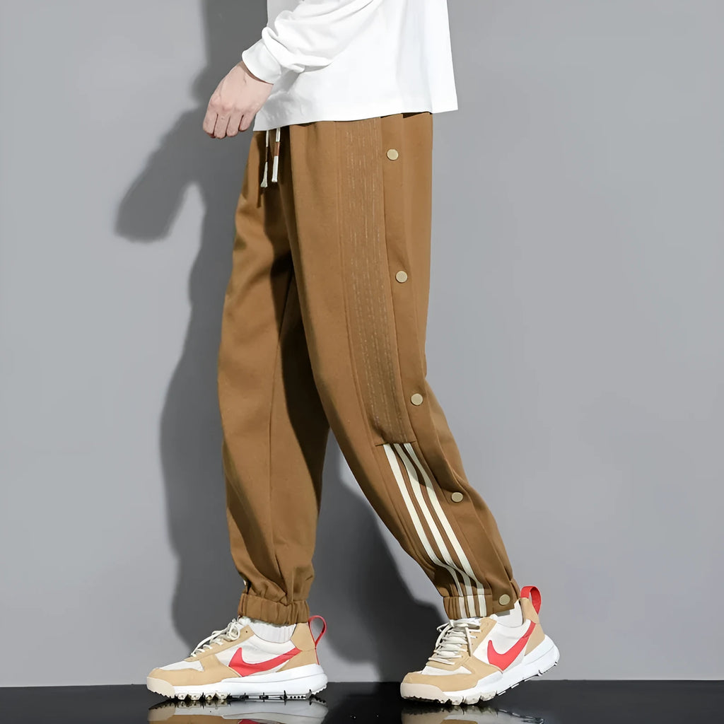 Men's loose cotton blend sweatpants with ankle-tied cuffs in black colour