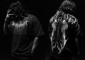 Dark style men's loose cotton short-sleeve T-shirt with gilding craft detailing on a mannequin.
