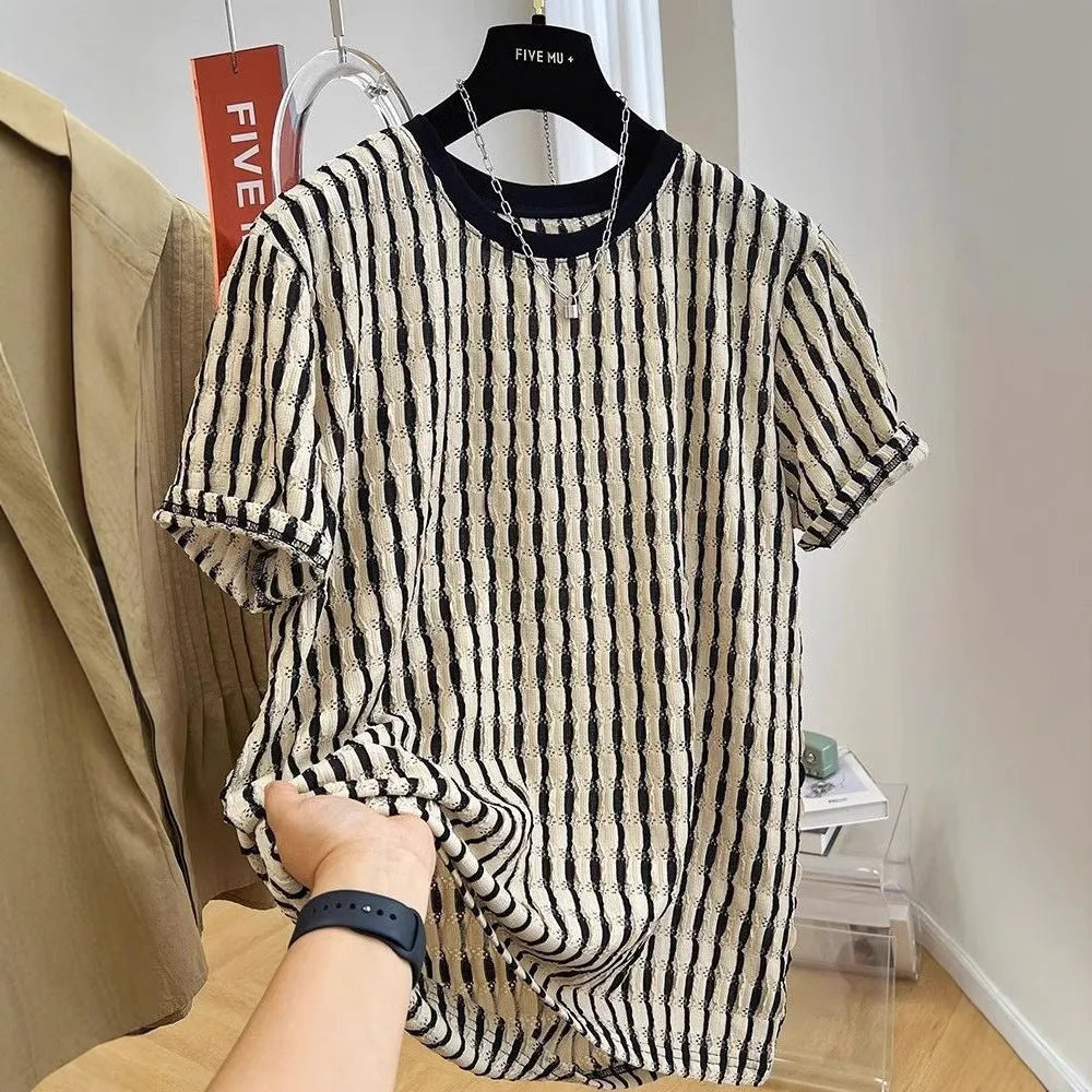 Men's black striped casual shirt with loose fit and short sleeves on hanger