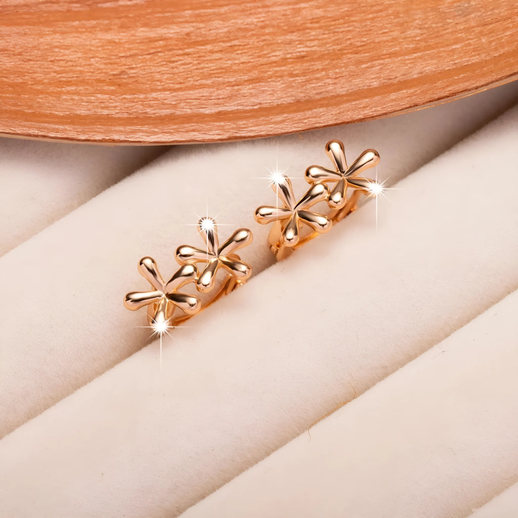 Circular rose gold electroplated earrings with waterdrop flower design for women