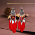 Round drop feather earrings in alloy with leaf shape and Bohemian patterning