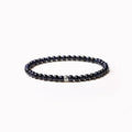 Geometric unisex bracelet with black obsidian, blue san, and cut black agate 4mm beads.