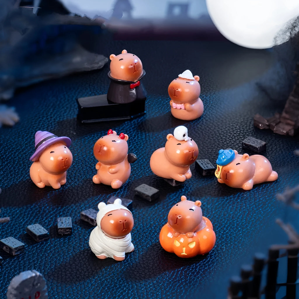 Micro landscape Halloween cute capybara resin decoration in pumpkin costume on a shelf
