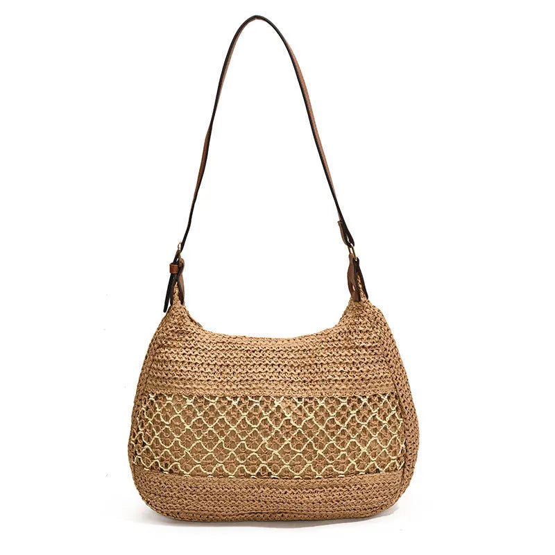 Women's straw cross body bag with horizontal square shape in khaki colour showing sandwich pocket design
