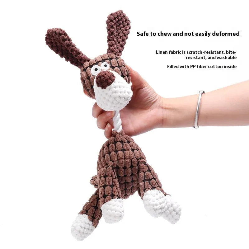 Assorted plush puppy chew toys including a grey donkey, a rechargeable yellow duck, and a blue elephant.