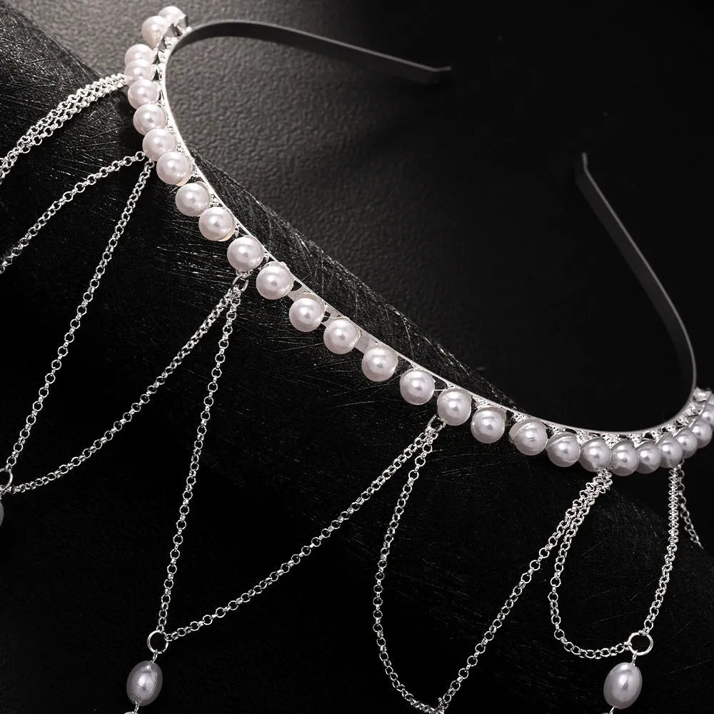 Gold and silver pearl mesh tassel hair chain for women on a white background.