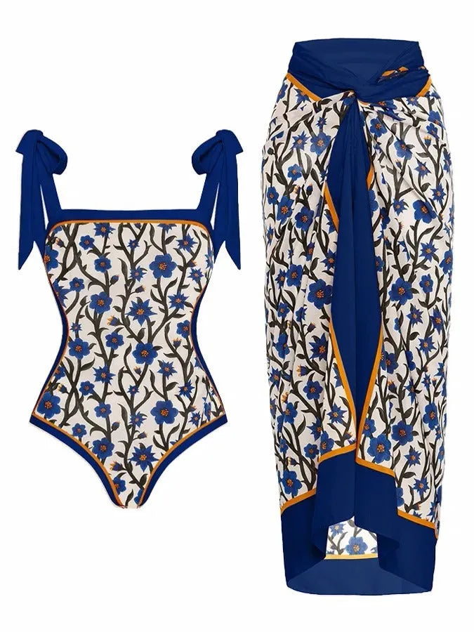 Women's printed two-piece chiffon swimsuit with matching hip skirt in a floral design.
