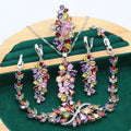 Retro copper jewellery set with zircon stones showing necklace, bracelet, earrings and ring with floral patterns
