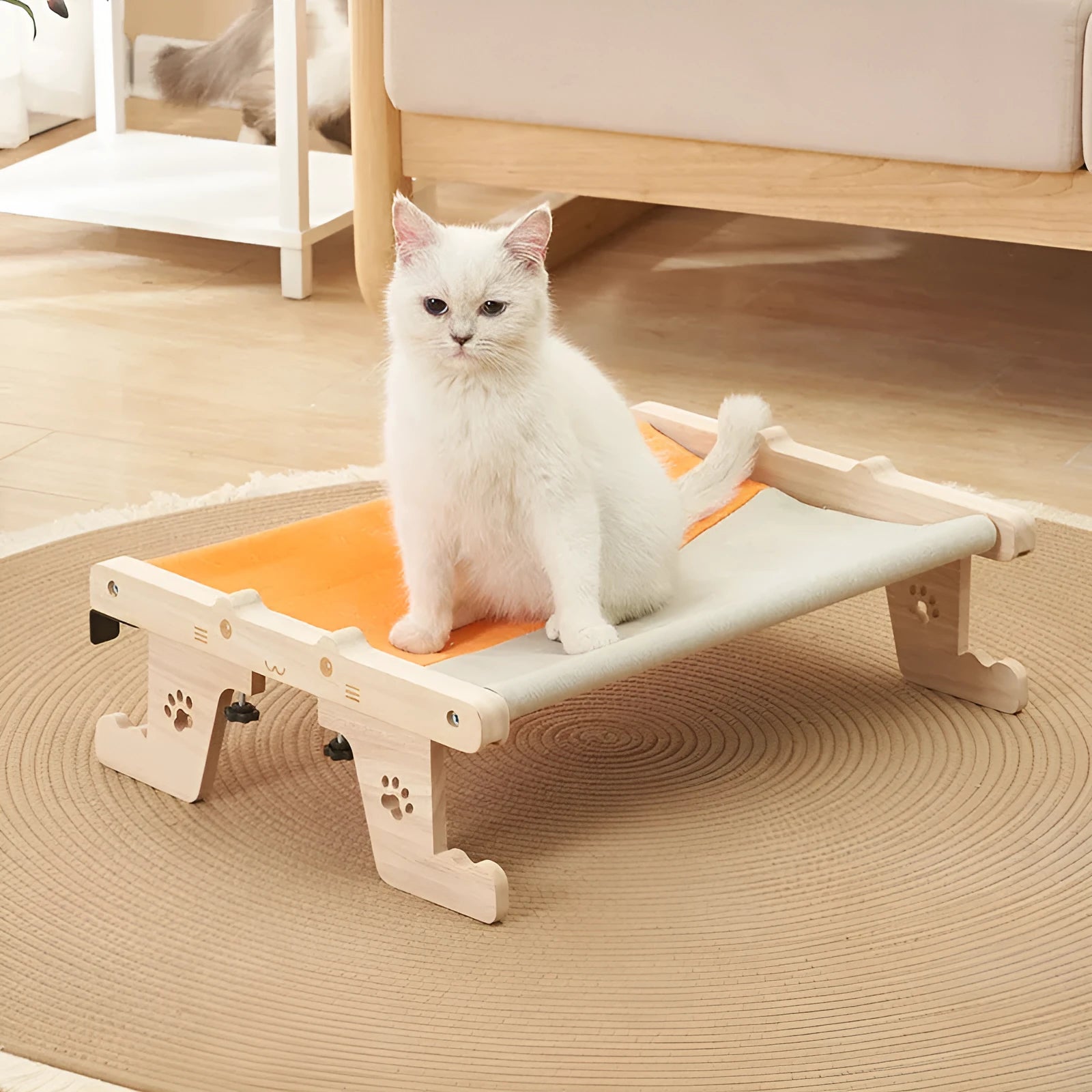 Wooden cat hanging bed hammock in a style style, mounted on a balcony railing for a cat to rest on.